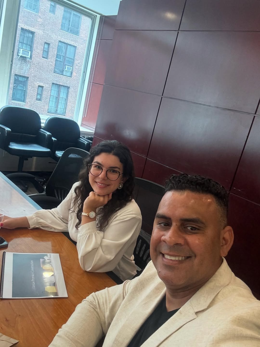 The Limas Premier Construction team meeting with a client