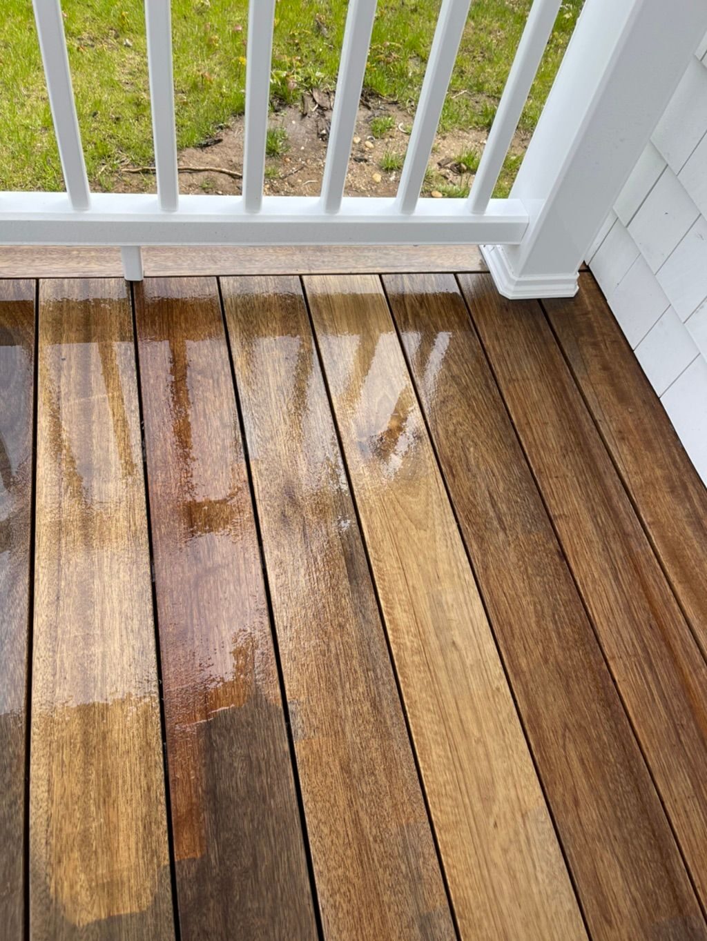 Wood deck boards refinished and sealed